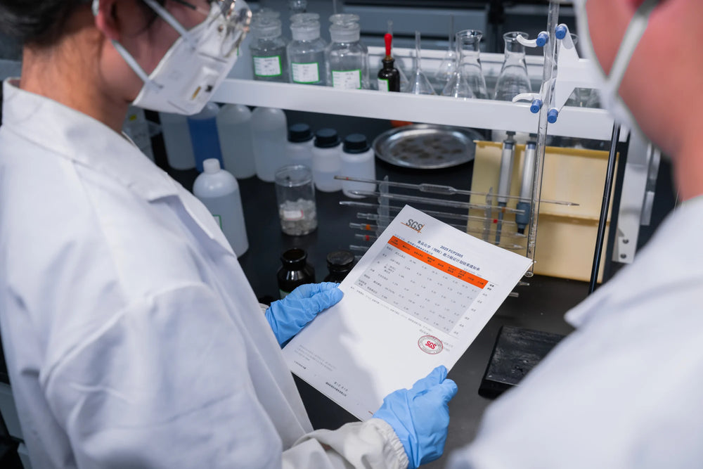Laboratory records reviewed alongside testing equipment.